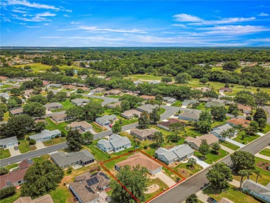 Here is your opportunity to purchase this meticulously on Eagle Ridge At Spruce Creek Country Club in Florida - for sale on GolfHomes.com, golf home, golf lot