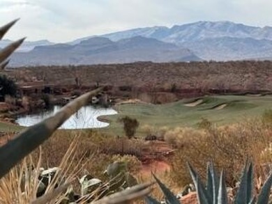 This is definitely a WOW home with STUNNING VIEWS of two on Entrada at Snow Canyon in Utah - for sale on GolfHomes.com, golf home, golf lot