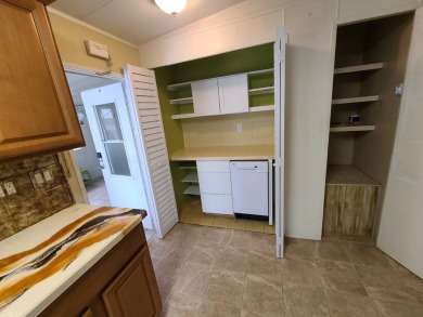 Welcome to this beautifully maintained 1983 home located in the on Heather Hills Golf Course in Florida - for sale on GolfHomes.com, golf home, golf lot