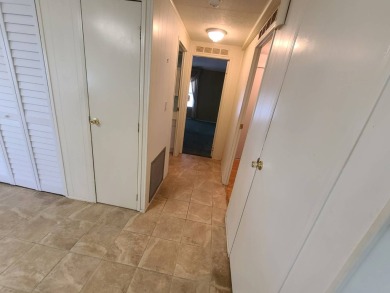 Welcome to this beautifully maintained 1983 home located in the on Heather Hills Golf Course in Florida - for sale on GolfHomes.com, golf home, golf lot