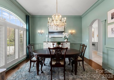 Set along the 14th hole of Trump National Golf Club Charlotte on Trump National Golf Club Charlotte in North Carolina - for sale on GolfHomes.com, golf home, golf lot