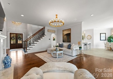 Set along the 14th hole of Trump National Golf Club Charlotte on Trump National Golf Club Charlotte in North Carolina - for sale on GolfHomes.com, golf home, golf lot