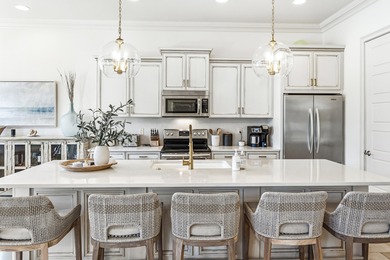 Welcome to 1946 Boardwalk Drive, a stunning 3-bedroom plus bunk on Sandestin Golf and Beach Resort - Raven in Florida - for sale on GolfHomes.com, golf home, golf lot