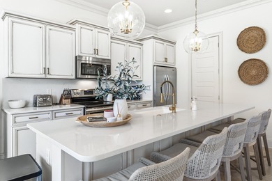 Welcome to 1946 Boardwalk Drive, a stunning 3-bedroom plus bunk on Sandestin Golf and Beach Resort - Raven in Florida - for sale on GolfHomes.com, golf home, golf lot