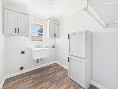 This exceptionally-updated 3 bedroom, 3 bathroom brick home in on Cedar Creek Country Club in Texas - for sale on GolfHomes.com, golf home, golf lot