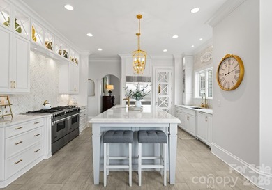 Set along the 14th hole of Trump National Golf Club Charlotte on Trump National Golf Club Charlotte in North Carolina - for sale on GolfHomes.com, golf home, golf lot