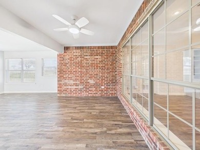 This exceptionally-updated 3 bedroom, 3 bathroom brick home in on Cedar Creek Country Club in Texas - for sale on GolfHomes.com, golf home, golf lot