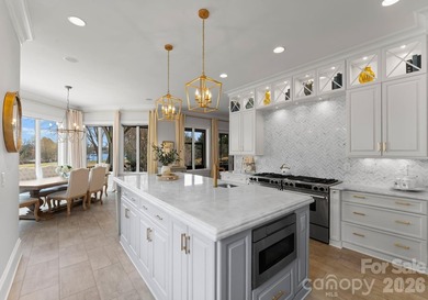 Set along the 14th hole of Trump National Golf Club Charlotte on Trump National Golf Club Charlotte in North Carolina - for sale on GolfHomes.com, golf home, golf lot