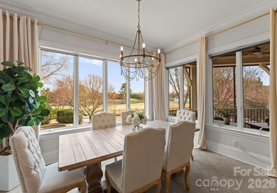 Set along the 14th hole of Trump National Golf Club Charlotte on Trump National Golf Club Charlotte in North Carolina - for sale on GolfHomes.com, golf home, golf lot