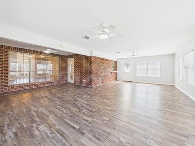 This exceptionally-updated 3 bedroom, 3 bathroom brick home in on Cedar Creek Country Club in Texas - for sale on GolfHomes.com, golf home, golf lot