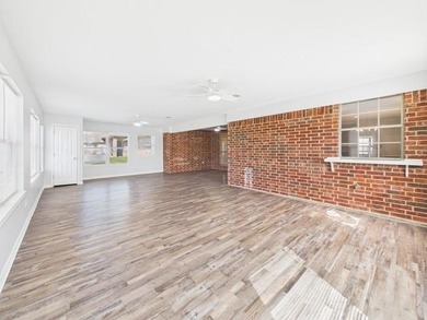 This exceptionally-updated 3 bedroom, 3 bathroom brick home in on Cedar Creek Country Club in Texas - for sale on GolfHomes.com, golf home, golf lot