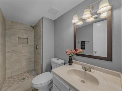 This townhouse has three sizable bedrooms each with private on Prairie Lakes Golf Club in Texas - for sale on GolfHomes.com, golf home, golf lot