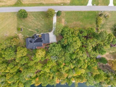 Welcome to the perfect spot for lake living! Nestled on on Peninsula Golf Resort in Kentucky - for sale on GolfHomes.com, golf home, golf lot