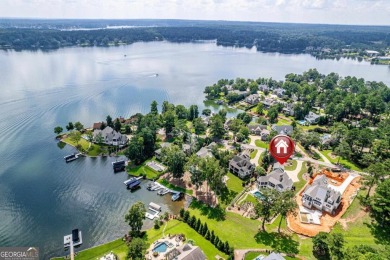 Luxury Lakefront Living. Welcome to 131 Cape View Lane, located on The Golf Club at Cuscowilla in Georgia - for sale on GolfHomes.com, golf home, golf lot