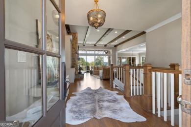 Luxury Lakefront Living. Welcome to 131 Cape View Lane, located on The Golf Club at Cuscowilla in Georgia - for sale on GolfHomes.com, golf home, golf lot