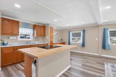 Check out this charming home where you own your own land in the on Sabal Trace Golf and Country Club in Florida - for sale on GolfHomes.com, golf home, golf lot