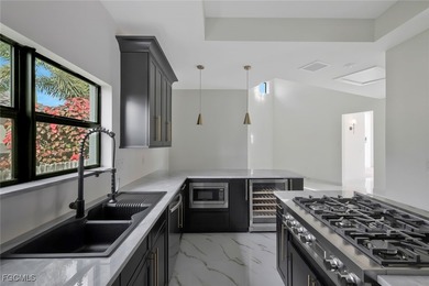 Gulf Access Lakefront Luxury Estate - New Construction 5 Bedroom on Burnt Store Golf Club in Florida - for sale on GolfHomes.com, golf home, golf lot