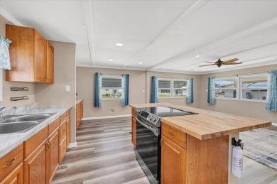 Check out this charming home where you own your own land in the on Sabal Trace Golf and Country Club in Florida - for sale on GolfHomes.com, golf home, golf lot