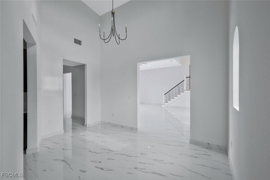 Gulf Access Lakefront Luxury Estate - New Construction 5 Bedroom on Burnt Store Golf Club in Florida - for sale on GolfHomes.com, golf home, golf lot