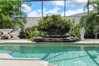 This charming courtyard pool home is more than just a house; on Rotonda Golf and Country Club The Palms Course in Florida - for sale on GolfHomes.com, golf home, golf lot