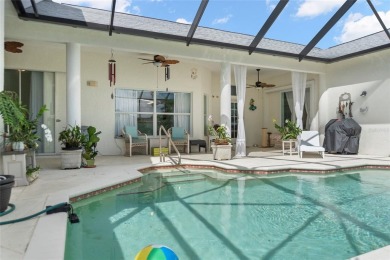 This charming courtyard pool home is more than just a house; on Rotonda Golf and Country Club The Palms Course in Florida - for sale on GolfHomes.com, golf home, golf lot