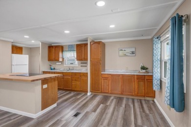 Check out this charming home where you own your own land in the on Sabal Trace Golf and Country Club in Florida - for sale on GolfHomes.com, golf home, golf lot