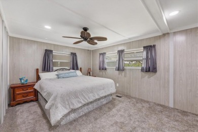 Check out this charming home where you own your own land in the on Sabal Trace Golf and Country Club in Florida - for sale on GolfHomes.com, golf home, golf lot