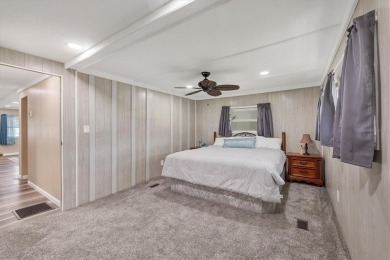 Check out this charming home where you own your own land in the on Sabal Trace Golf and Country Club in Florida - for sale on GolfHomes.com, golf home, golf lot