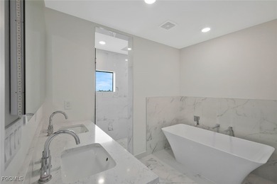 Gulf Access Lakefront Luxury Estate - New Construction 5 Bedroom on Burnt Store Golf Club in Florida - for sale on GolfHomes.com, golf home, golf lot