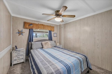 Check out this charming home where you own your own land in the on Sabal Trace Golf and Country Club in Florida - for sale on GolfHomes.com, golf home, golf lot