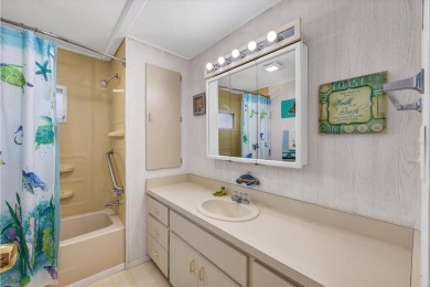 Check out this charming home where you own your own land in the on Sabal Trace Golf and Country Club in Florida - for sale on GolfHomes.com, golf home, golf lot