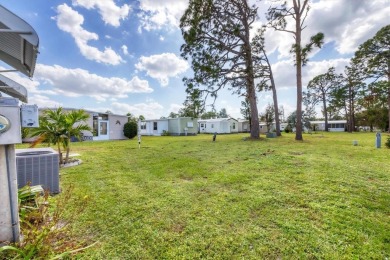 Check out this charming home where you own your own land in the on Sabal Trace Golf and Country Club in Florida - for sale on GolfHomes.com, golf home, golf lot