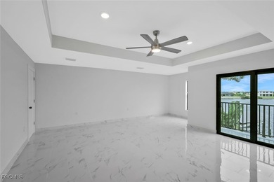 Gulf Access Lakefront Luxury Estate - New Construction 5 Bedroom on Burnt Store Golf Club in Florida - for sale on GolfHomes.com, golf home, golf lot