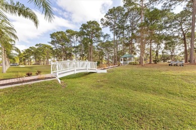 Check out this charming home where you own your own land in the on Sabal Trace Golf and Country Club in Florida - for sale on GolfHomes.com, golf home, golf lot