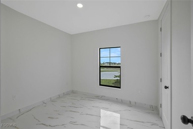 Gulf Access Lakefront Luxury Estate - New Construction 5 Bedroom on Burnt Store Golf Club in Florida - for sale on GolfHomes.com, golf home, golf lot