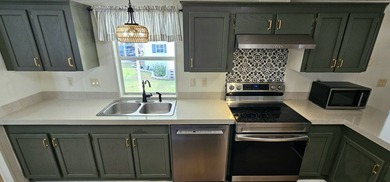 Stunning 3 bedroom 3 bath homewith unique double master on Zephyrhills Municipal Golf Course in Florida - for sale on GolfHomes.com, golf home, golf lot