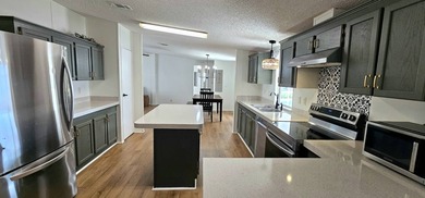 Stunning 3 bedroom 3 bath homewith unique double master on Zephyrhills Municipal Golf Course in Florida - for sale on GolfHomes.com, golf home, golf lot