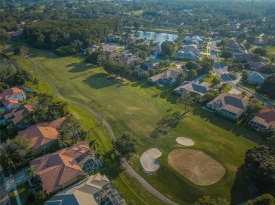 WELCOME TO GREENHAVEN IN AN EXCLUSIVE GATED GOLF COURSE on East Lake Woodlands Country Club in Florida - for sale on GolfHomes.com, golf home, golf lot