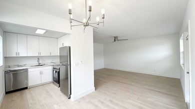 SELLER MOTIVATED. Bright & Spacious First-Floor Corner Unit! on Hillsboro Pines Golf in Florida - for sale on GolfHomes.com, golf home, golf lot