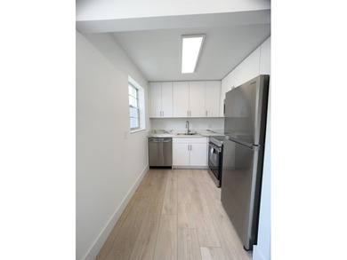 SELLER MOTIVATED. Bright & Spacious First-Floor Corner Unit! on Hillsboro Pines Golf in Florida - for sale on GolfHomes.com, golf home, golf lot