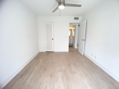 SELLER MOTIVATED. Bright & Spacious First-Floor Corner Unit! on Hillsboro Pines Golf in Florida - for sale on GolfHomes.com, golf home, golf lot