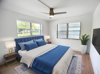 SELLER MOTIVATED. Bright & Spacious First-Floor Corner Unit! on Hillsboro Pines Golf in Florida - for sale on GolfHomes.com, golf home, golf lot