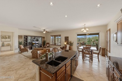 A relaxing retreat in the gated Estrella Fairways, surrounded by on Estrella Mountain Ranch Golf Course in Arizona - for sale on GolfHomes.com, golf home, golf lot