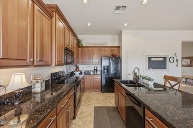 A relaxing retreat in the gated Estrella Fairways, surrounded by on Estrella Mountain Ranch Golf Course in Arizona - for sale on GolfHomes.com, golf home, golf lot