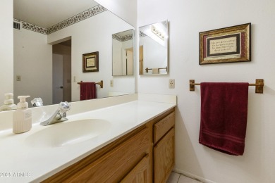 Welcome to this well-maintained home in the highly sought-after on Fountain of the Sun Country Club in Arizona - for sale on GolfHomes.com, golf home, golf lot