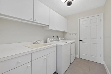 COMMUNITY POOL. MAINTENANCE FREEPLETELY RENOVATED.  HURRICANE on Calusa Lakes Golf Club in Florida - for sale on GolfHomes.com, golf home, golf lot