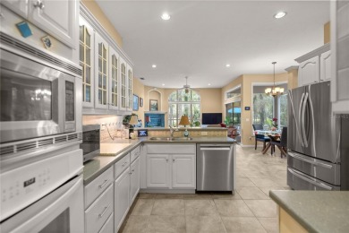 This stunning 4-bedroom, 3-bath Tom Hunt home is perfectly on Haile Plantation Golf and Country Club in Florida - for sale on GolfHomes.com, golf home, golf lot