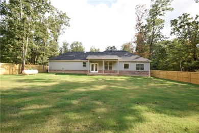 Welcome home to Bella Vista, just minutes from Lake Loch Lomond! on Bella Vista Country Club - Highlands in Arkansas - for sale on GolfHomes.com, golf home, golf lot