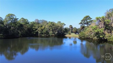 First-floor coastal retreat with vast lagoon views from all on Shipyard Golf Club in South Carolina - for sale on GolfHomes.com, golf home, golf lot
