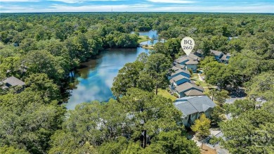 First-floor coastal retreat with vast lagoon views from all on Shipyard Golf Club in South Carolina - for sale on GolfHomes.com, golf home, golf lot